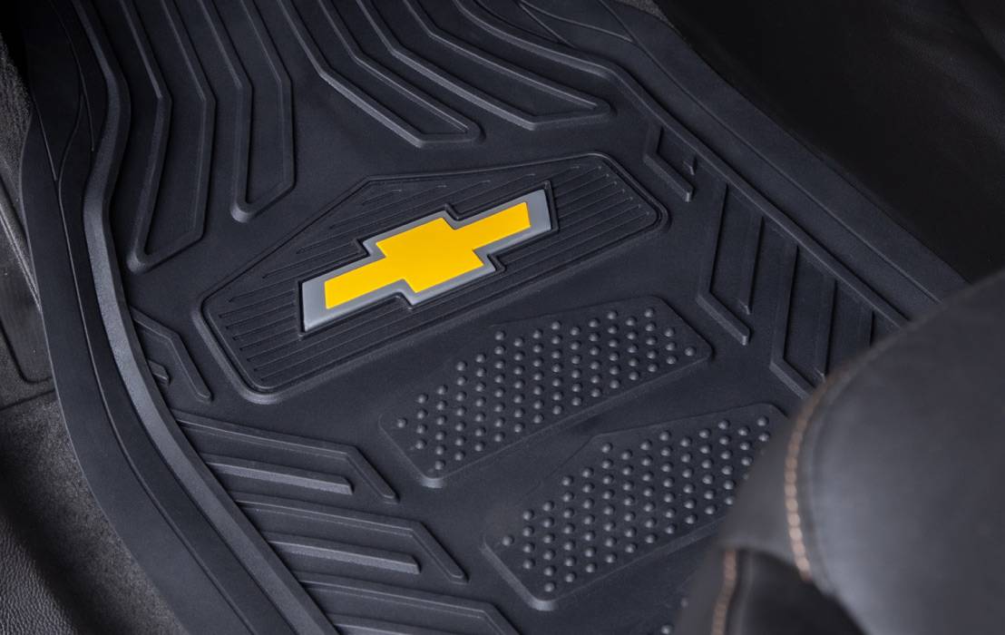 A car floor mat with the Chevrolet logo displayed